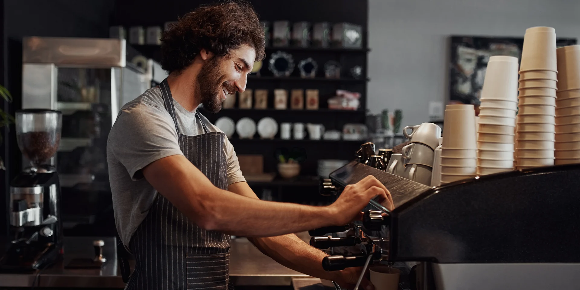 man working in a cafe Startup Business with Insurance