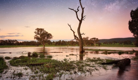 flooded landscape at sunset used on a blog about disaster and preparedness for businesses in Australia