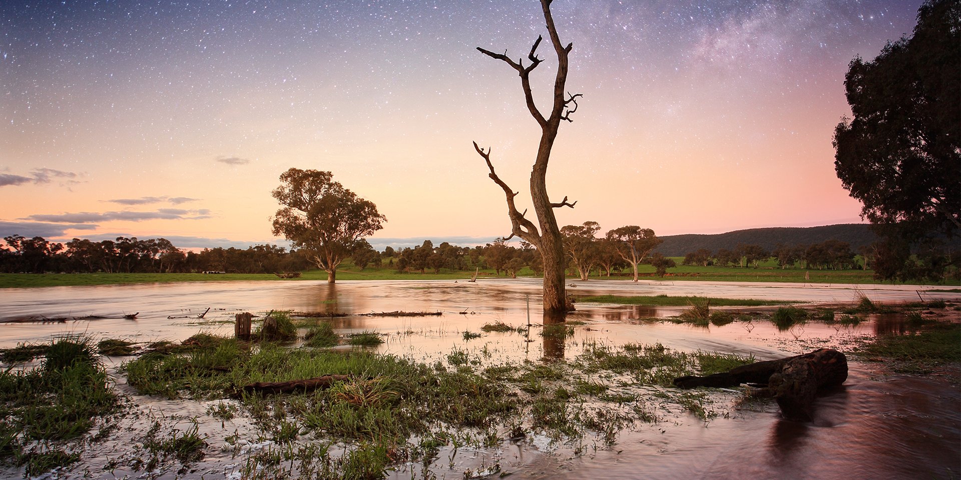 flooded landscape at sunset used on a blog about disaster and preparedness for businesses in Australia